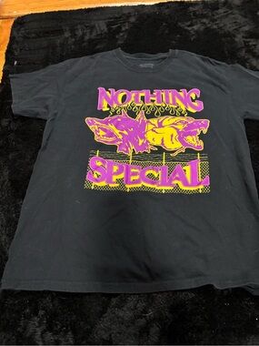 Black 'Nothing Special' Graphic Tee with Purple and yellow guard dogs Artwork
